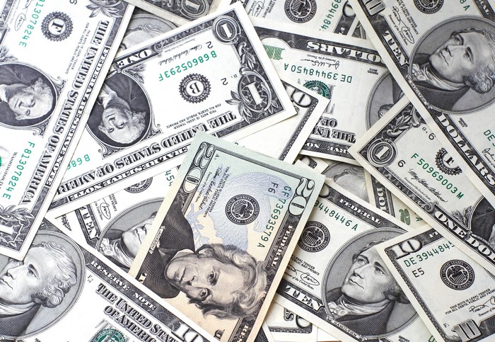 US Dollar Bills Scattered