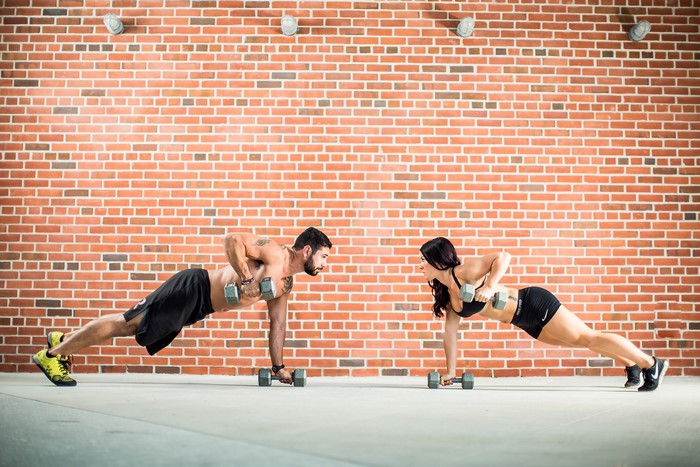 Fitness Couple Working Out with Dumbbells 4K