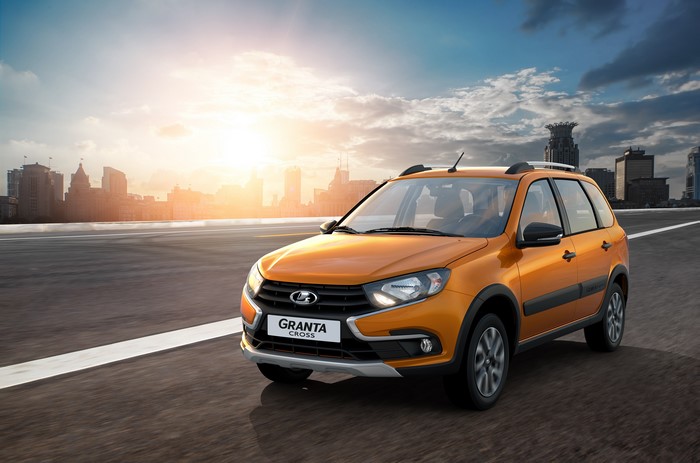 Orange 2018 Lada Granta Cross driving