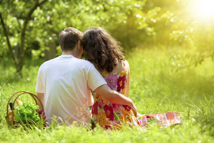 Couple having a picnic in a sunny park