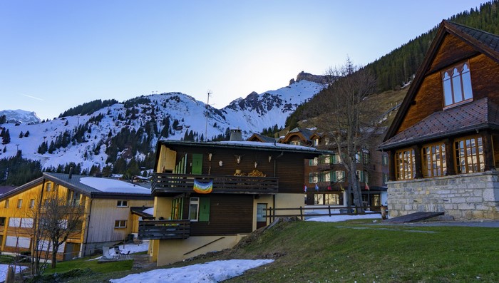 Murren Village, Switzerland with Snowy Mountains and Houses