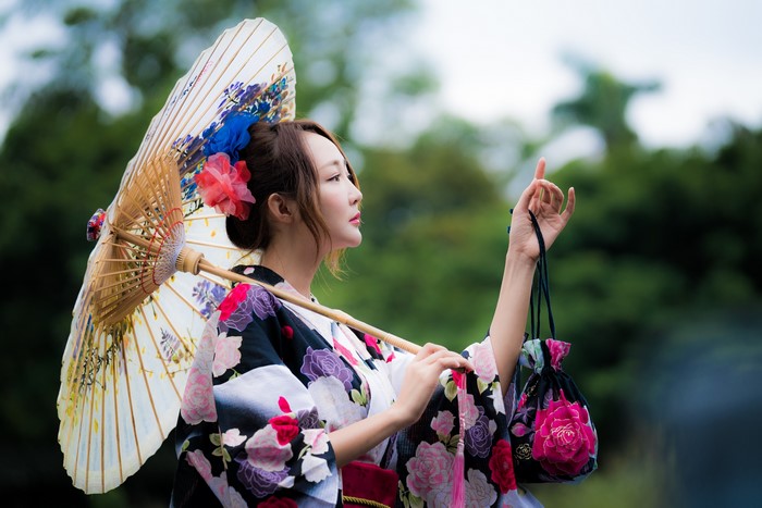 Woman in Kimono Holding Umbrella