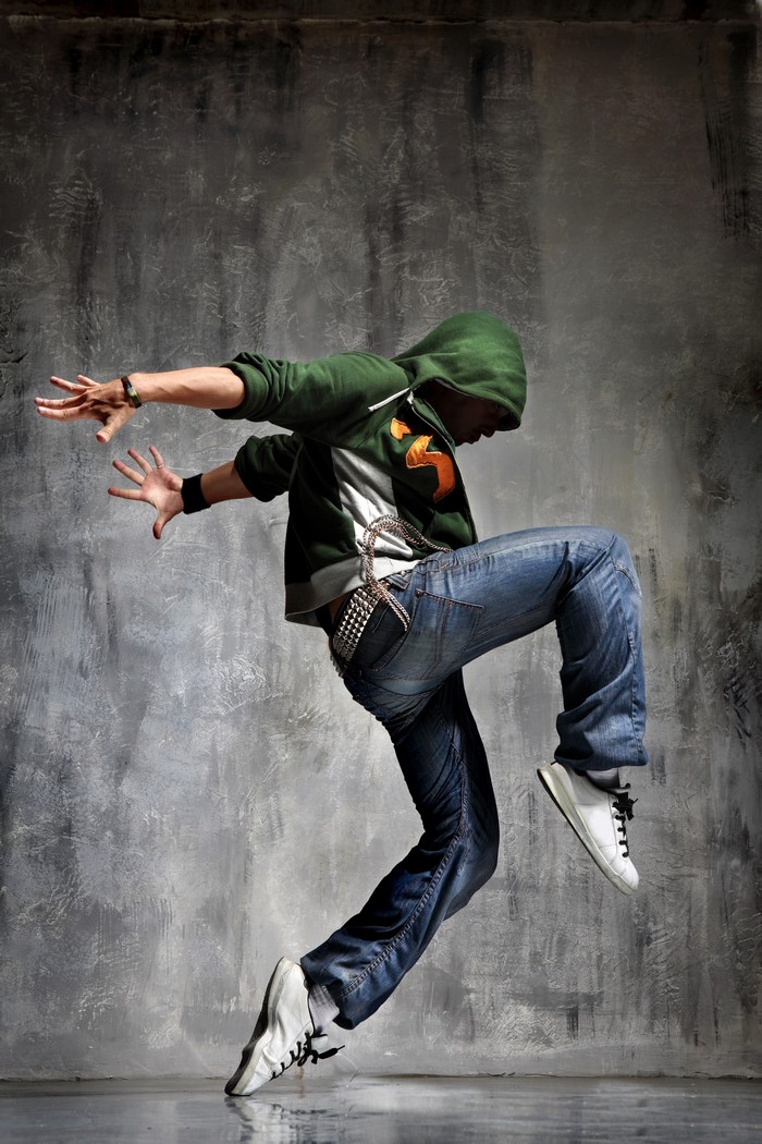 Man in green hoodie dancing