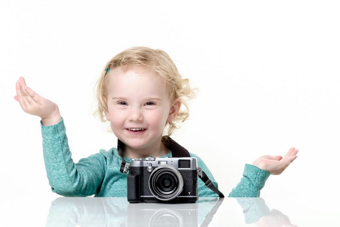 Young girl with a camera