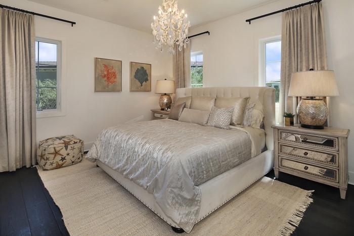 Bedroom with Chandelier and Bed