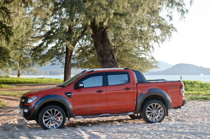 Orange Ford Ranger Wildtrak Pickup Truck on Beach