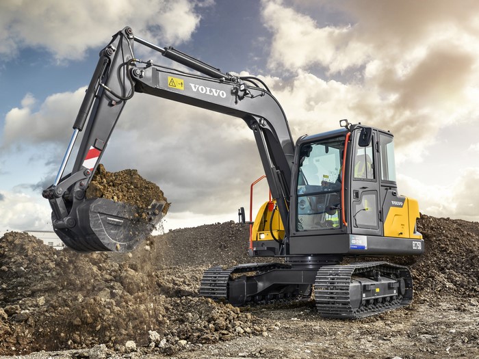 Volvo EC75D Excavator digging dirt