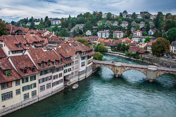 Bern, Switzerland: River Aare and historic buildings with bridge