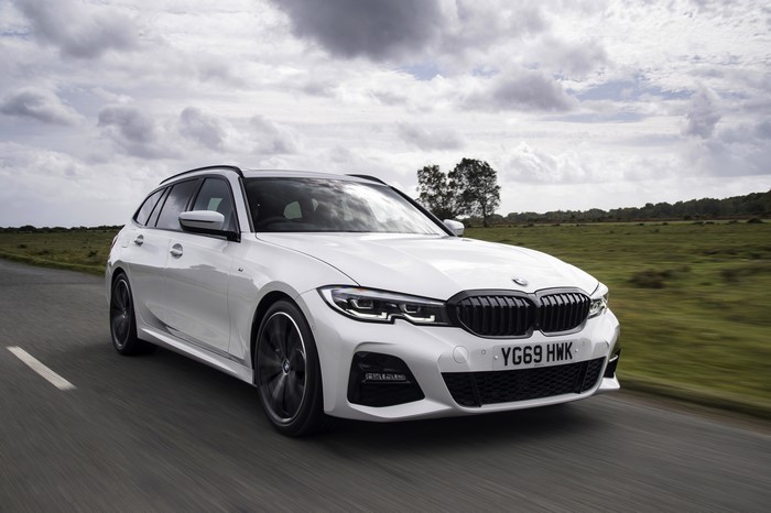 White BMW G21 330i Touring Estate Car in Motion