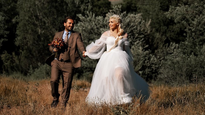 Bride and Groom in a field