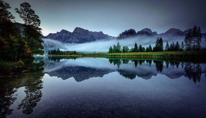 4K Morning Fog over Lake Almsee and Mountains in Austria