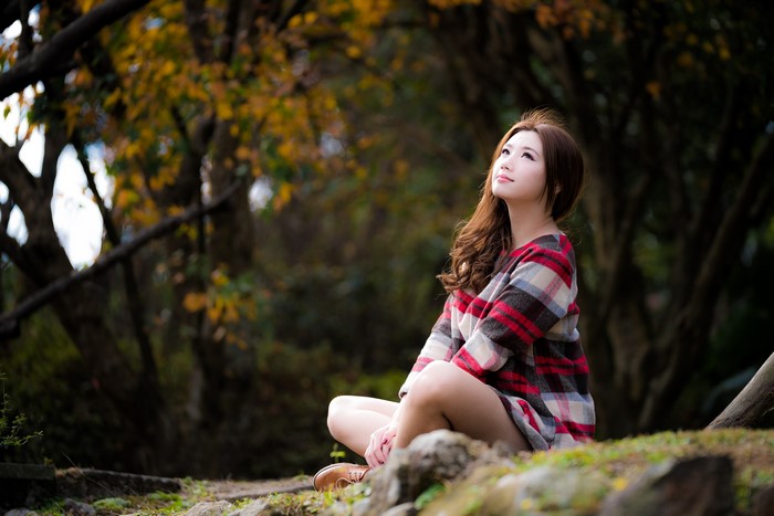 4K Cute Brown Haired Woman Sitting Outdoors
