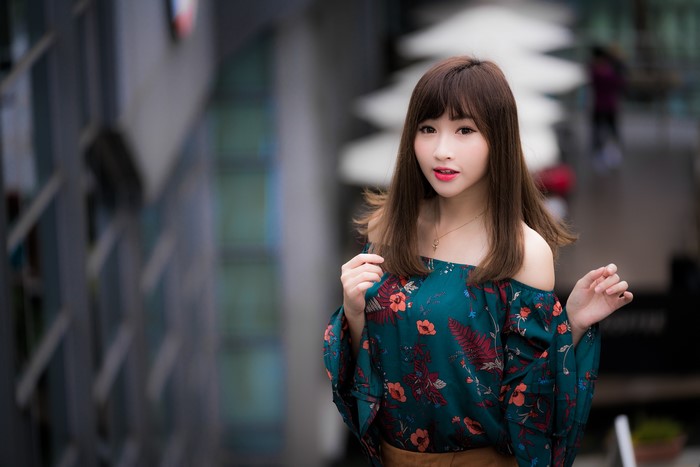 4K Portrait of Young Woman with Brown Hair in Bokeh