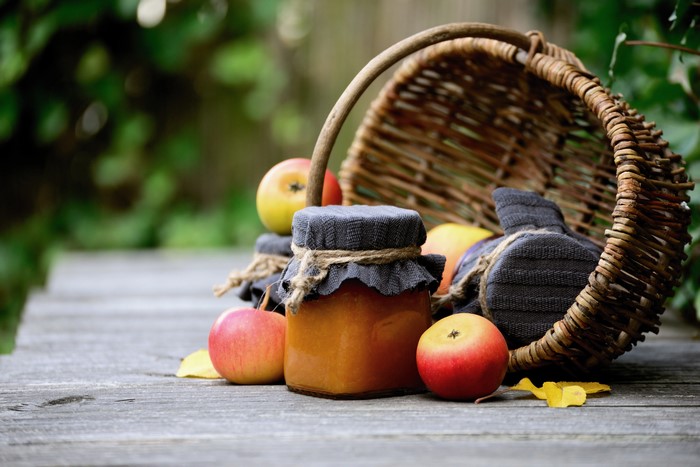 Jam and Apples in a Wicker Basket