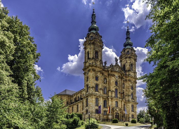Basilika Vierzehnheiligen church in Germany with flags