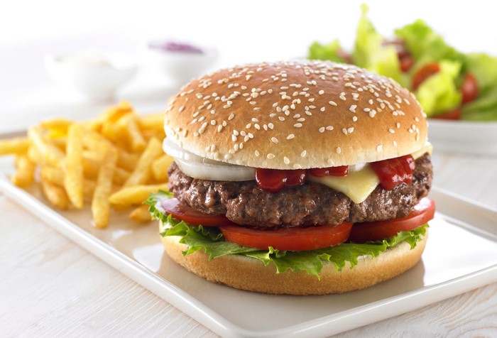 Hamburger with fries and salad