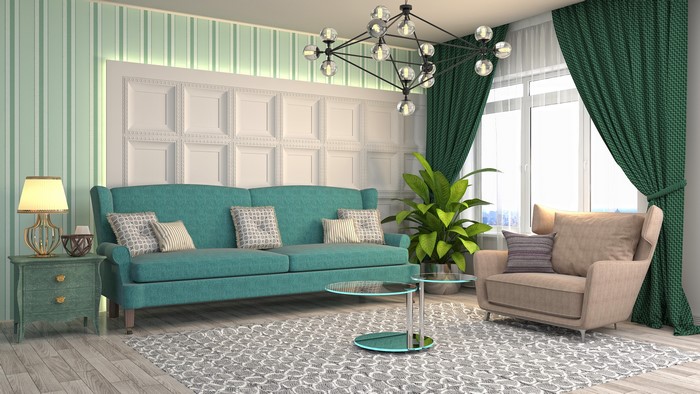 Living room with teal sofa and armchair