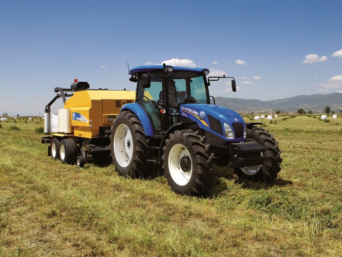 New Holland TD5.115 Cab tractor with baler