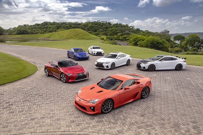 Collection of Lexus cars on a paved driveway