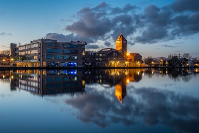 Royal Verkade building at dusk with reflection in Zaandam, Netherlands