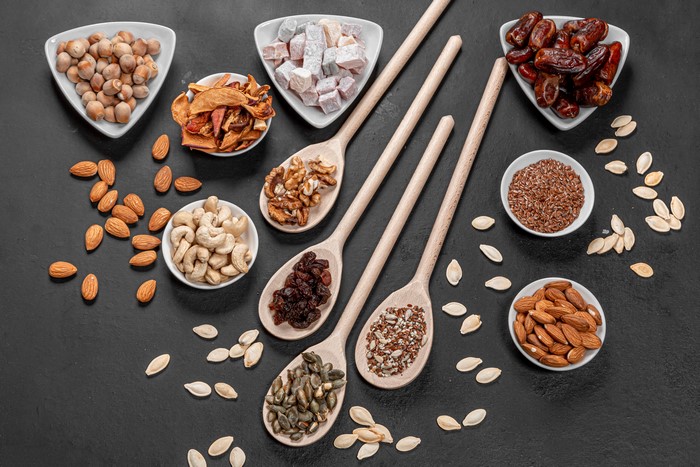 Assortment of Nuts, Dried Fruits, and Seeds on Spoons