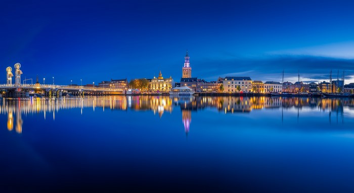 Kampen blue hour cityscape with river reflection