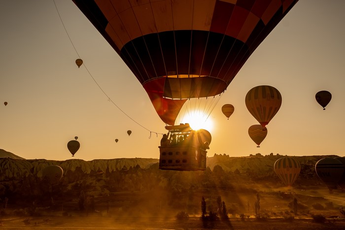 Hot air balloons at sunrise over Cappadocia