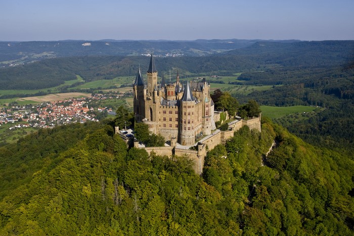 Hohenzollern Castle on a forested hill in Germany