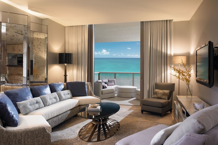 Living room with ocean view and balcony