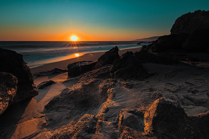 Sunset over the ocean coast in California