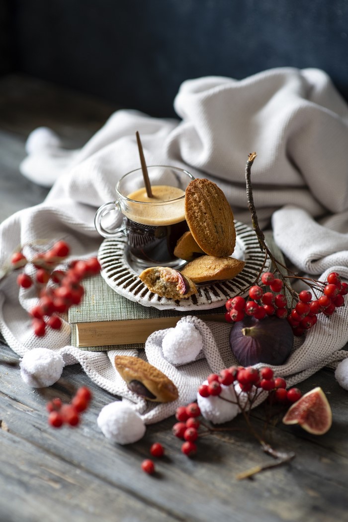 Coffee with Madeleines and Berries on Wooden Table