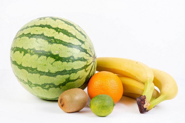 Watermelon, Bananas, Kiwi, Orange, and Lime on White Background