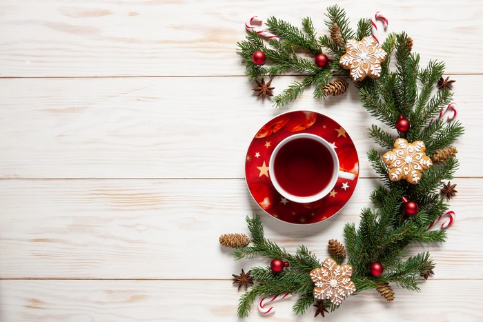 Christmas tea with gingerbread and fir branches