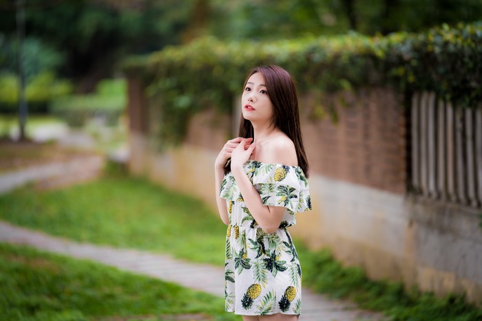 4K Cute Brown-Haired Woman in Pineapple Dress