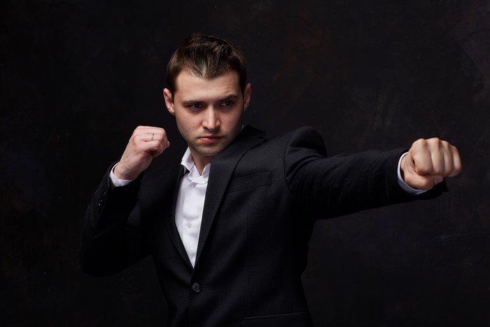 Man in Suit in Fighting Pose
