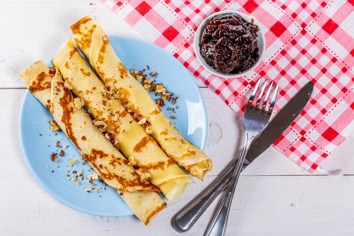 Pancakes with Jam and Nuts on a Plate