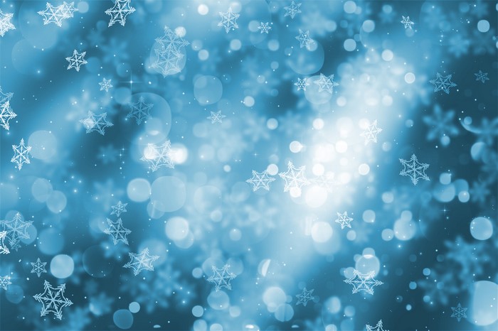 Snowflakes and bokeh on a blue background