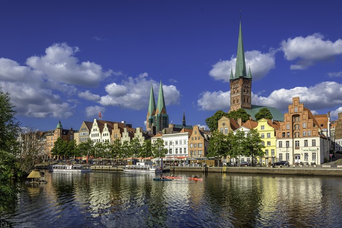 Luebeck, Germany skyline with river and boats