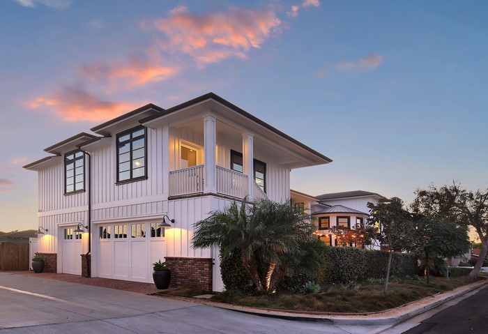 Modern White House with Garage at Dusk in Newport Beach