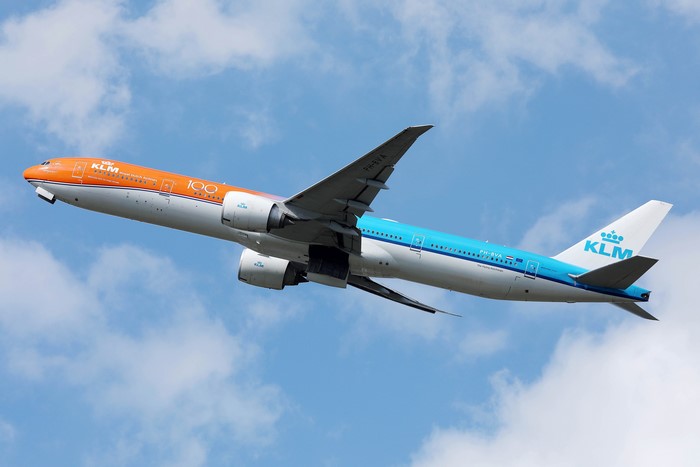 KLM Orange livery Boeing 777 airplane in flight