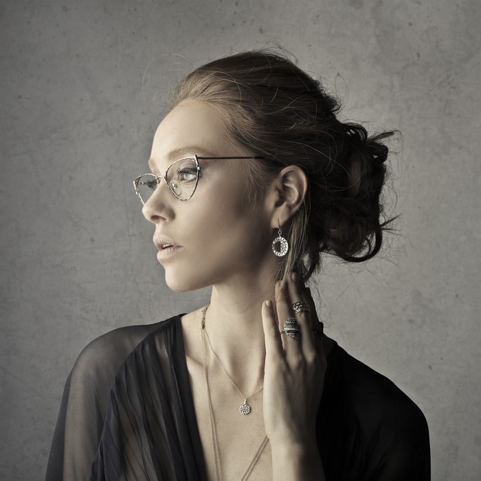 Woman with Glasses and Jewelry