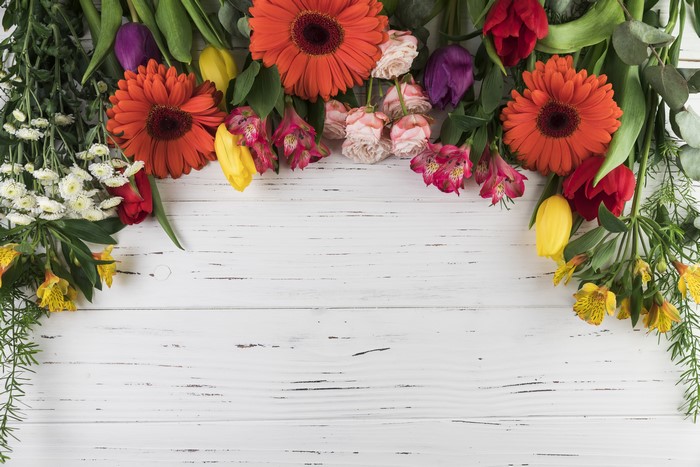 Gerberas, Tulips, Roses, and Alstroemeria on Wood Planks