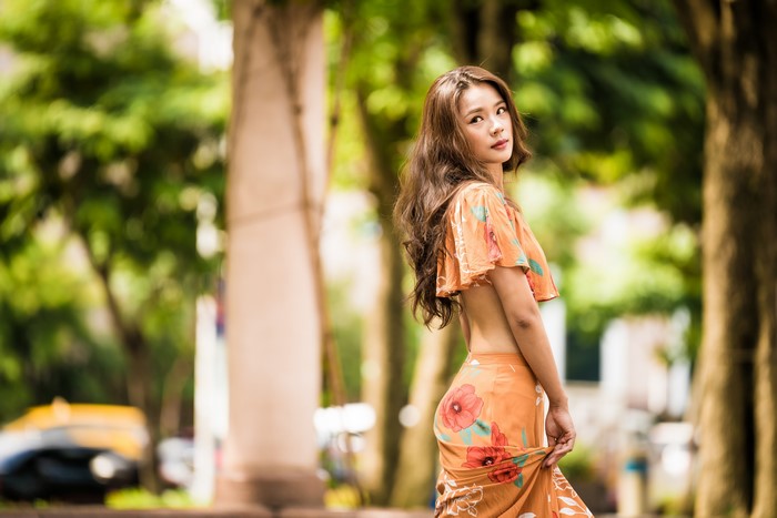 4K Portrait of Woman in Orange Floral Dress
