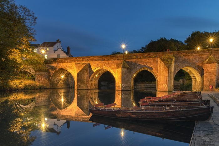 Durham City Bridge with Boats at Dusk