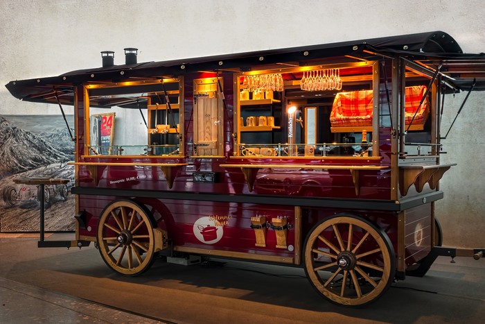 Retro food cart with wooden wheels and bar