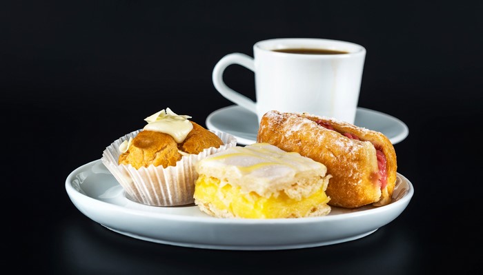 Plate of pastries with a cup of coffee