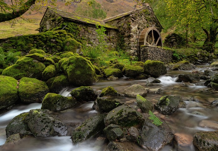 Moss-covered watermill in Borrowdale Valley, Cumbria, England