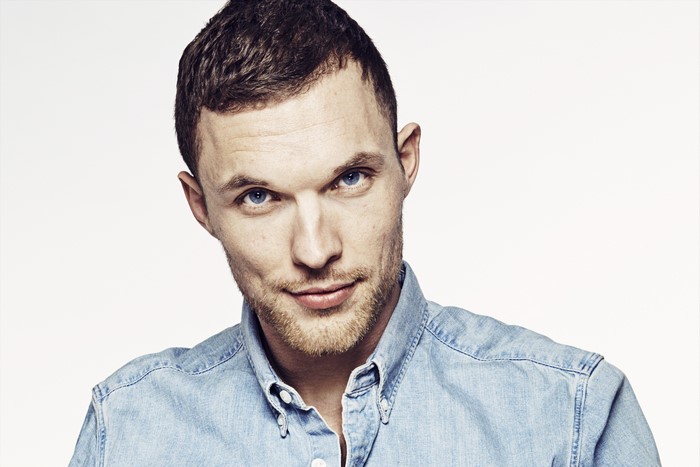 Ed Skrein wearing a denim shirt