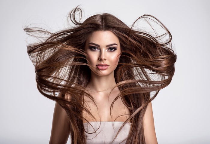 Brown haired woman with flowing hair