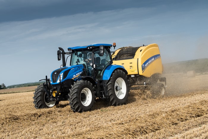 New Holland T6.175 Tractor Baling Hay in a Field
